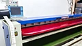 Machine de mesure à rouleaux pour peaux souples larges