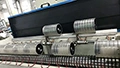 Machine de mesure à rouleaux pour peaux souples larges